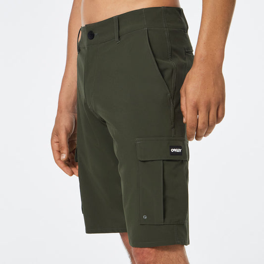 Green cargo shorts with a brand logo on a white background