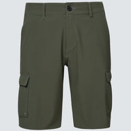 Green cargo shorts on a light gray background