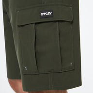 Green cargo shorts with a visible Oakley logo on a white background