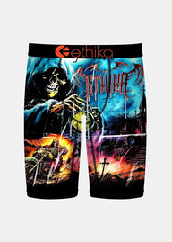 Colorful graphic shorts with a skeleton and motorcycle design, featuring the brand 'Ethika'.