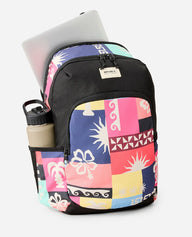 Colorful patterned backpack with laptop and water bottle on a white background
