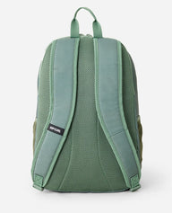 Green backpack with Rip Curl logo on a white background