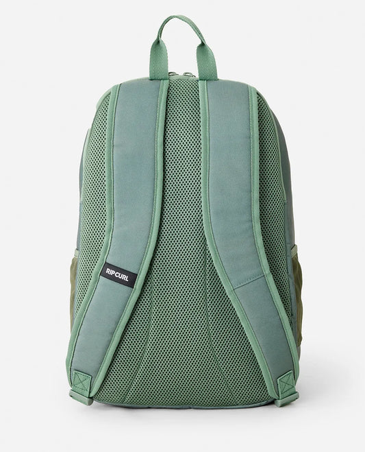 Green backpack with Rip Curl logo on a white background