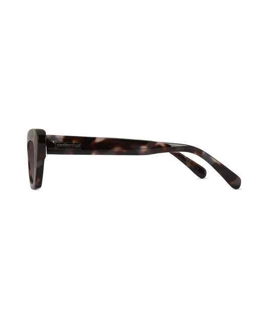 Side view of a tort sunglasses on a white background