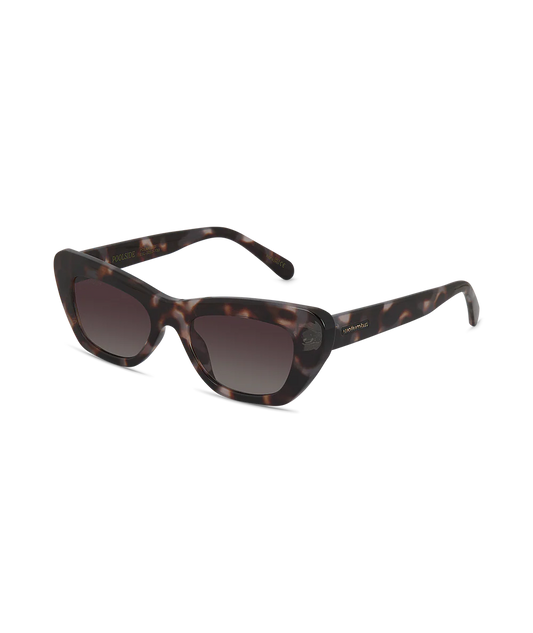 Cat-eye sunglasses with a dark brown and black tortoiseshell pattern and gradient lenses, shown on a plain white background.