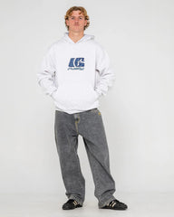 Person wearing a white hoodie with a logo and gray pants on a white background