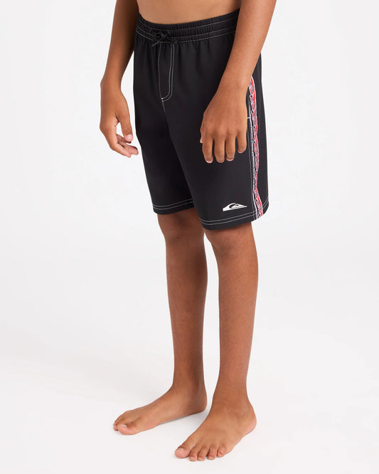 Black boardshort with maori design on the side 