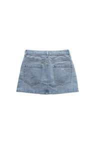 Light blue denim skirt on a white background