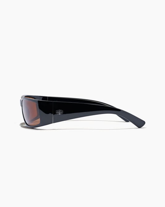 Black sunglasses with a reflective lens on a white background