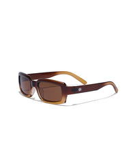 Brown sunglasses with a slight gradient on a white background