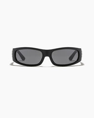 Black sunglasses with dark lenses on a white background