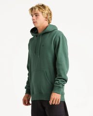 Person wearing a green hoodie on a white background