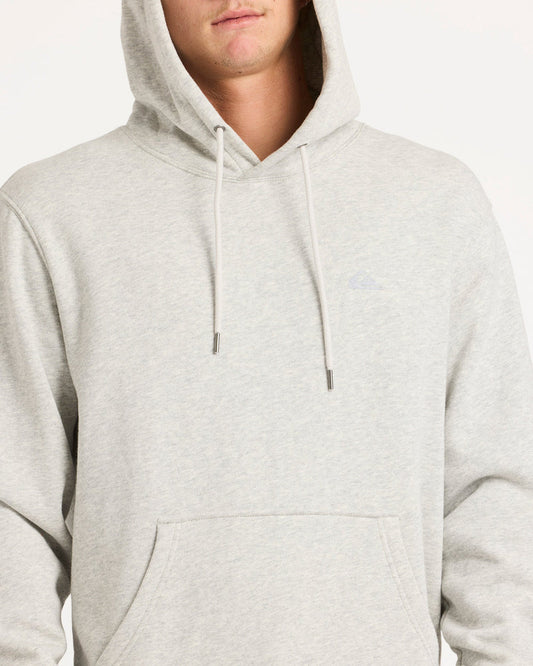 Gray hoodie worn by a person on a white background