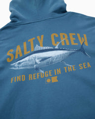 A close-up of a blue hoodie showing the back graphic with a tuna fish illustration and the text 'SALTY CREW' and 'FIND REFUGE IN THE SEA' in yellow.
