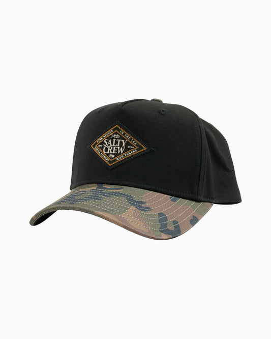 Black cap with camouflage brim and Salty Crew logo on a white background