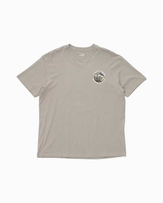 A light gray short-sleeve crewneck t-shirt with a small circular graphic printed on the left chest, displayed flat against a light gray background.