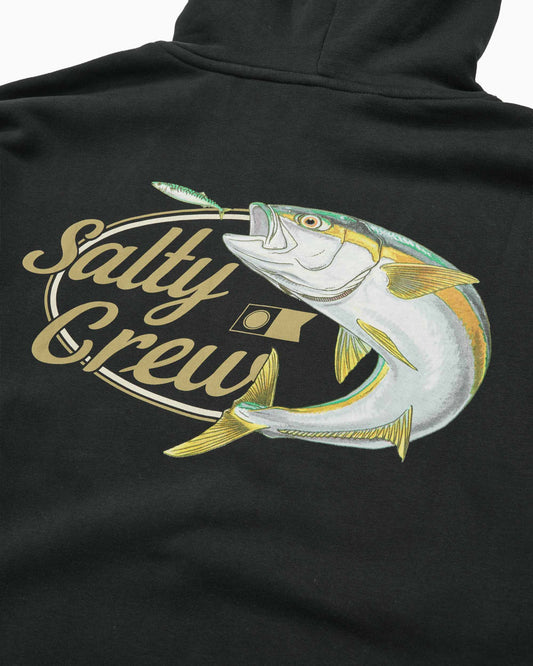 Close-up of a black hoodie featuring a large graphic print of a fish holding a lure, with the words 'Salty Crew' in gold script.