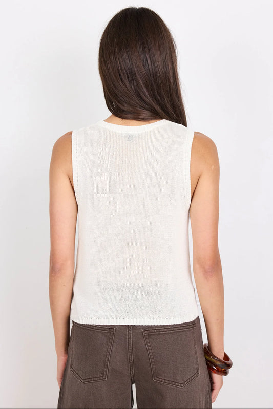 white sleeveless top 