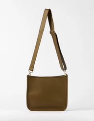 truffle shoulder bag with a strap on a white background