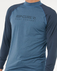 Blue long-sleeve shirt with Rip Curl logo on a white background