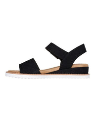 Black sandal with a suede sole on a white background