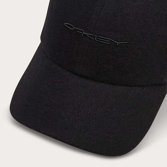 Black cap with a logo on a light gray background