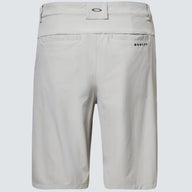 Light gray shorts with brand logo on a light gray background