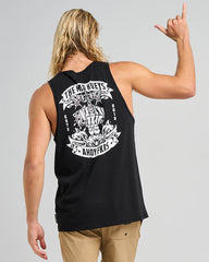 Person wearing a black sleeveless shirt with white graphics and text, pointing upwards.