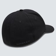 Black Oakley cap on a light gray background