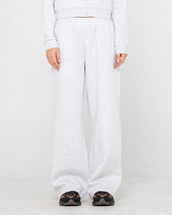 White pants worn by a person on a white background