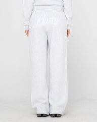 Light gray sweatpants worn by a person on a white background