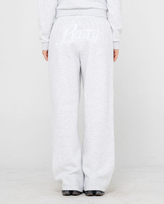 Light gray sweatpants worn by a person on a white background