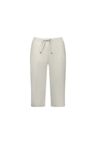 Woman wearing Vassalli Below Knee Skinny Leg Elastic Waist Pant in stone with white background