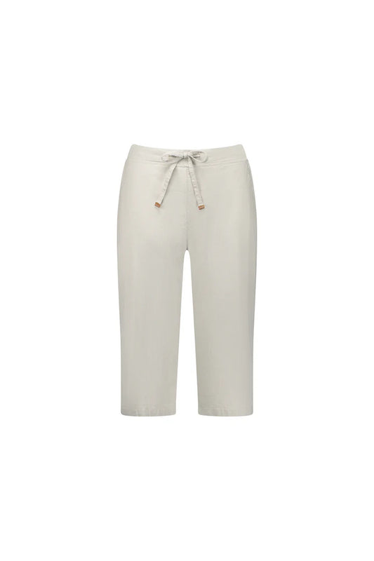Woman wearing Vassalli Below Knee Skinny Leg Elastic Waist Pant in stone with white background