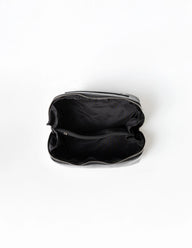 Black toiletry bag with zipper on a white background
