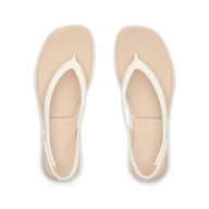 Beige flip-flops with white straps on a white background