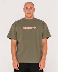 Man wearing a green t-shirt with 'RUSTY' logo on a white background