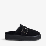 Black slip-on shoe with a buckle on a white background