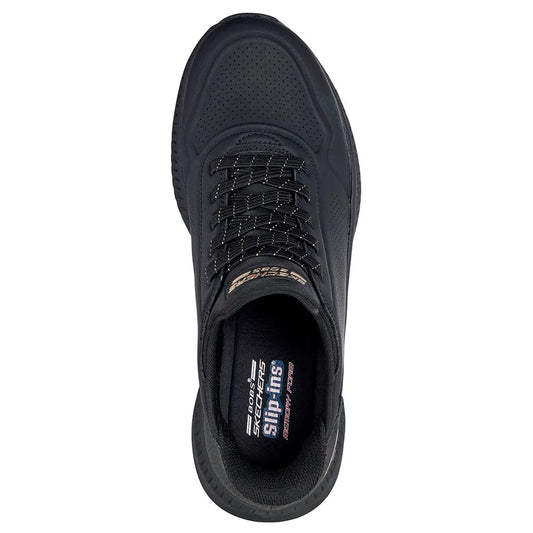 Black sneaker with 'Skechers' branding on a white background