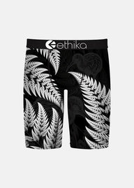 Black Ethika's with white leaf pattern and 'ethika' branding on a white background