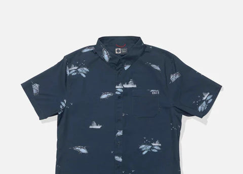 Navy blue shirt with white pattern on a light gray background