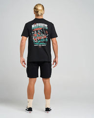 Person wearing a black t-shirt with a graphic design on the back, standing against a plain background