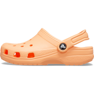 Peach-colored clog shoe on a white background