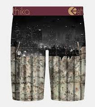 Boxer briefs with a cityscape design and 'Ethika' branding on a dark background