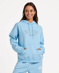Person wearing a light blue hoodie with 'Roxy' branding on a white background