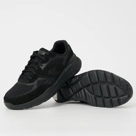 Black running shoes on a light gray background