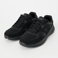 Pair of black sneakers on a white background