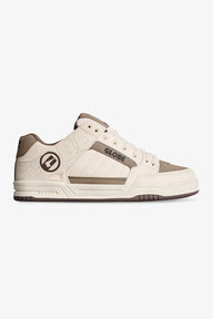 White and brown sneaker with 'Globe' logo on a white background