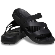 Black sandals with multiple straps on a white background
