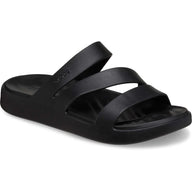 Black sandal with multiple straps on a white background